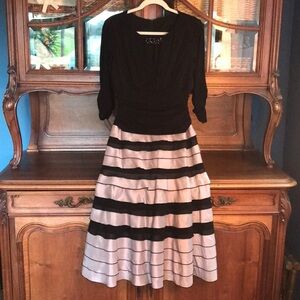 Soft blush and black party dress. Size 8